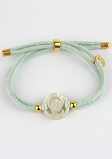 VIRGEN NIÑA. PULSERA ELÁSTICA VERDE MANCOTI