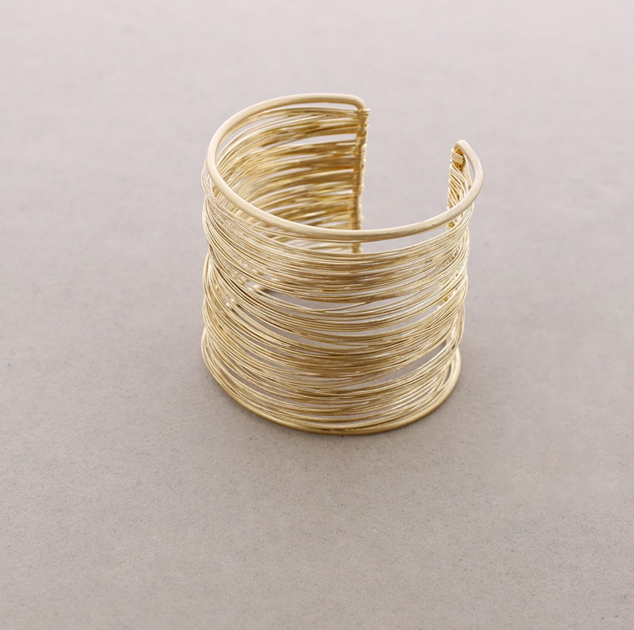 Brazalete hilo cilindro , oro