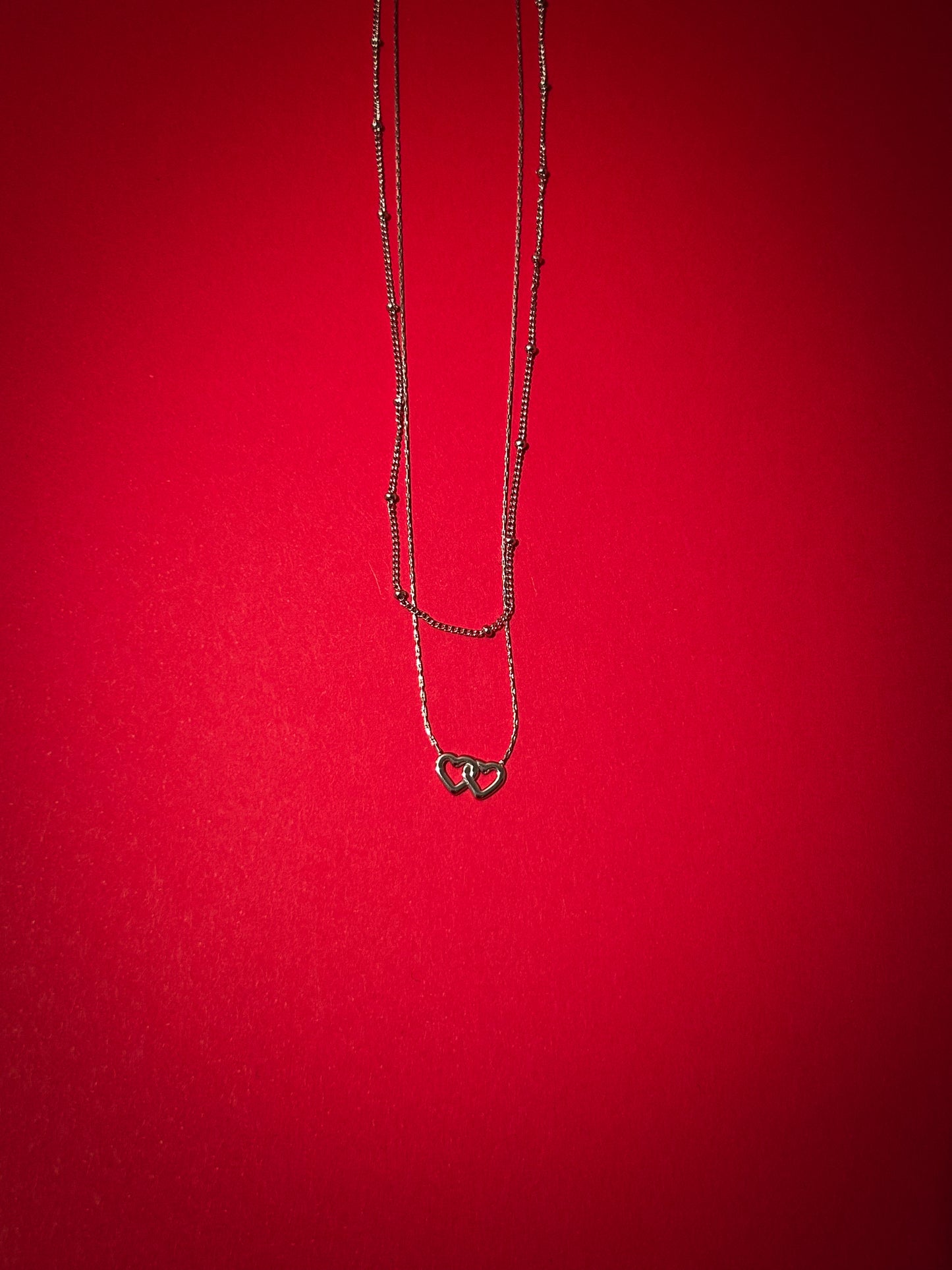 Collar doble corazón